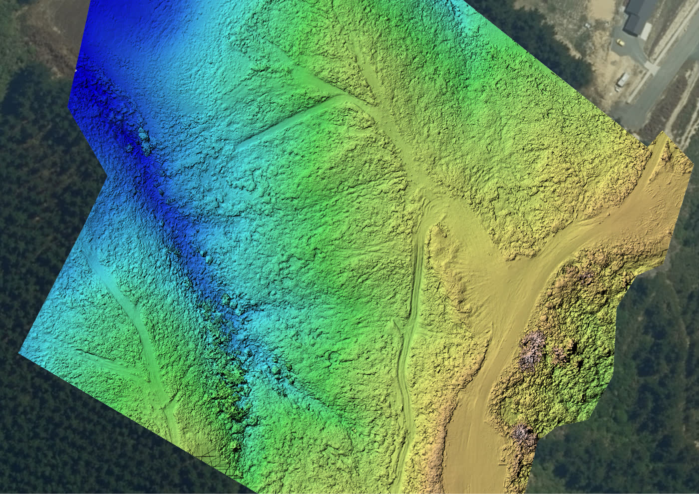 Colour-graded elevation model of the block, showing gullies and drainage under the cut