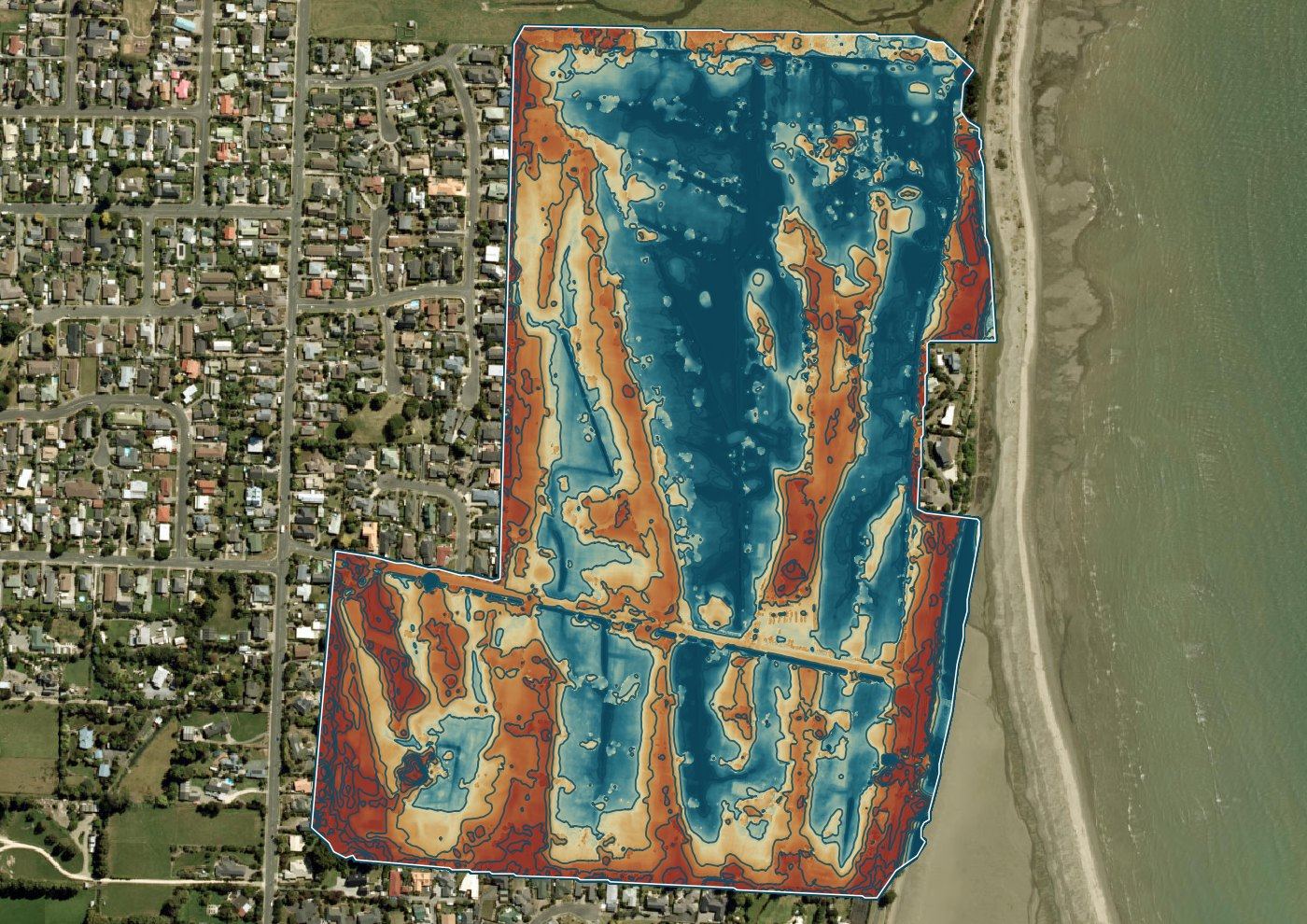 Colour elevation model of the same course with contours drawn over it, low ground blue and high ground warm