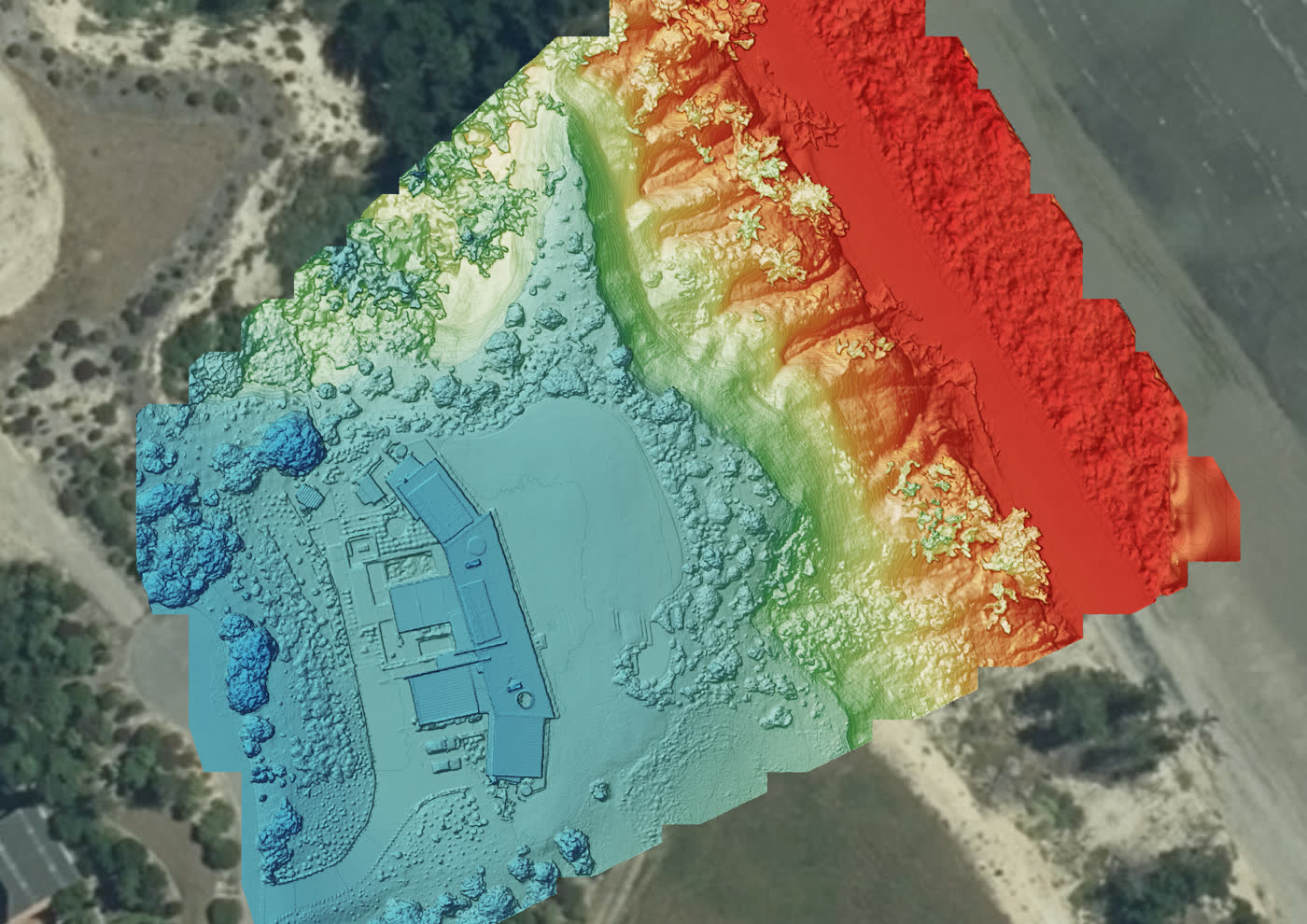 Colour-graded elevation model of the site, the cliff dropping from high ground to the flat